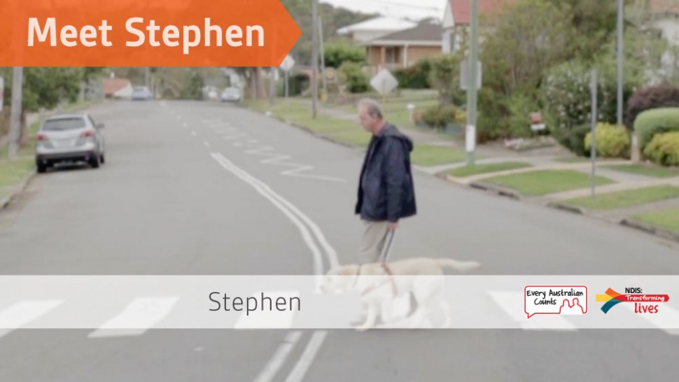 Stephen and his guide dog Selby walk across the road.