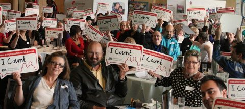 Group of Every Australian Counts supporters showing I count signs