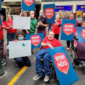 Self advocates and supporters rallying in the streets of Melbourne.