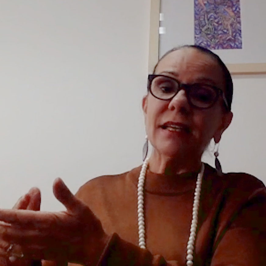 Still image from video showing Linda Burney looking into the camera and using her hands expressively.