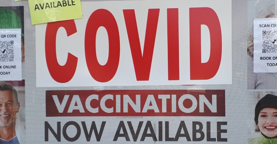 Sign that reads: "COVID Vaccination now available"