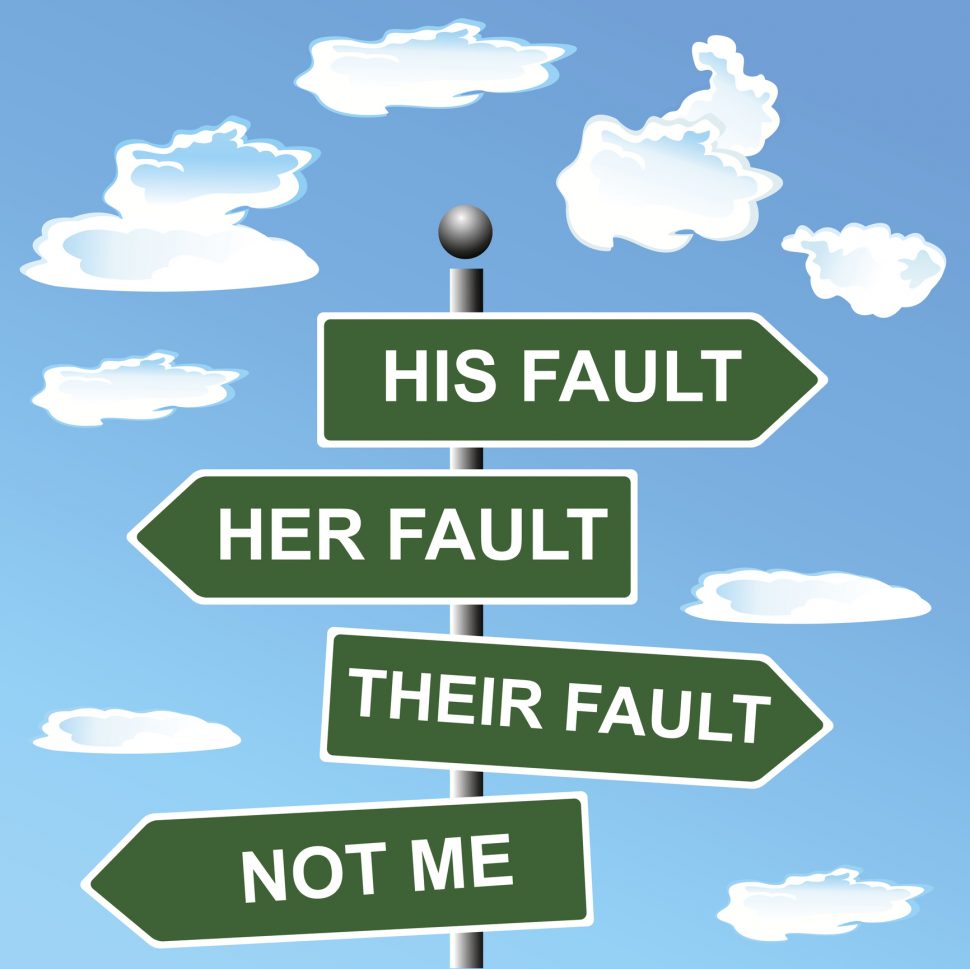 A series of road signs pointing in opposite directions. They read "His fault, Her fault, Their fault, Not me"