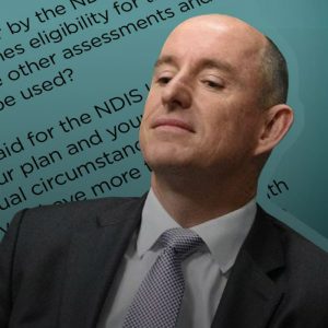 Minister for the NDIS Stuart Robert with text from our questions behind him.