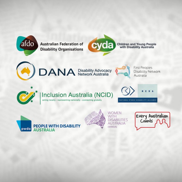 Blurry newspaper background with logos from the disability sector organisations behind the media release