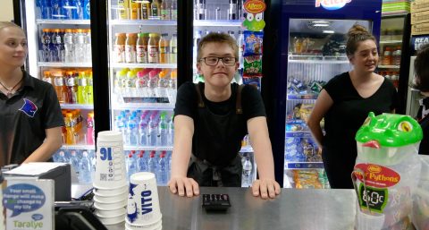 Young man working at counter